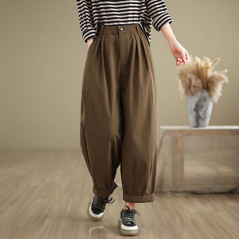 Pantalon décontracté en coton et lin pour femme avec poches et un bouton sur le dessus , couleur unie