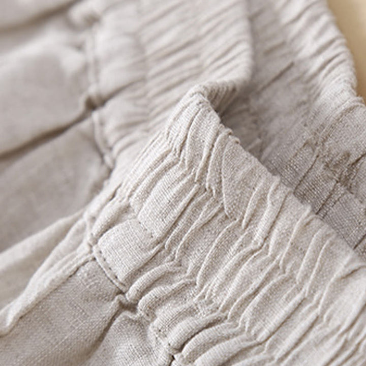 Pantalon en lin uni avec broderie florale sur le côté et poches pour femme avec Buddha Stones