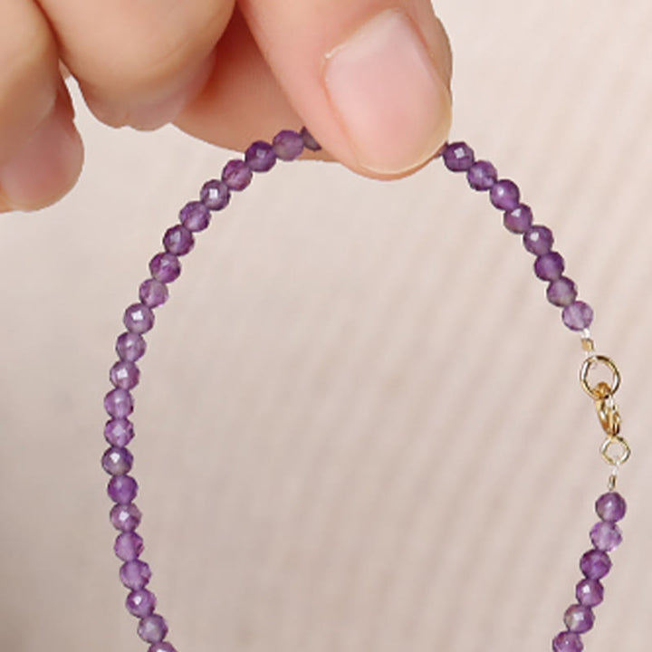 Bracelet de conscience spirituelle en cuivre plaqué or 14 carats avec perles ultra-fines en améthyste naturelle de 3 mm et Buddha Stones