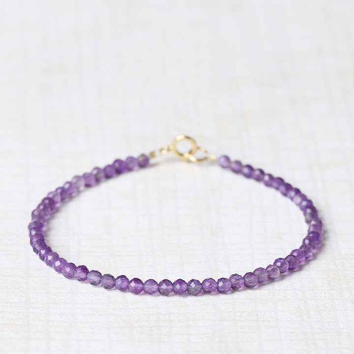 Bracelet de conscience spirituelle en cuivre plaqué or 14 carats avec perles ultra-fines en améthyste naturelle de 3 mm et Buddha Stones