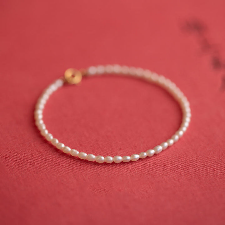 Bracelet de sagesse en cuivre plaqué or 14 carats avec perles naturelles ultra fines de 2 mm et Buddha Stones