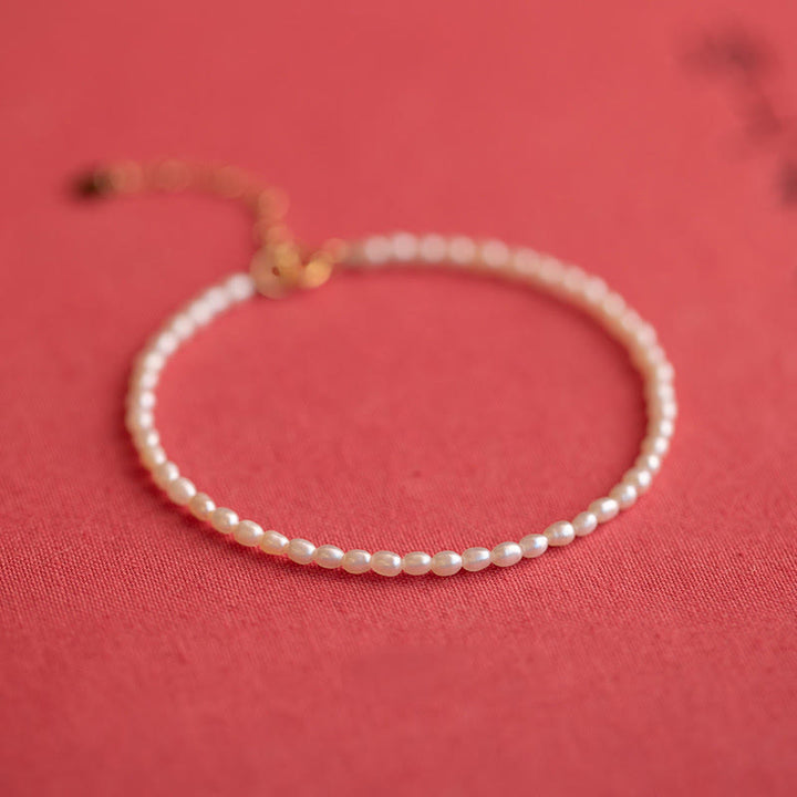 Bracelet de sagesse en cuivre plaqué or 14 carats avec perles naturelles ultra fines de 2 mm et Buddha Stones