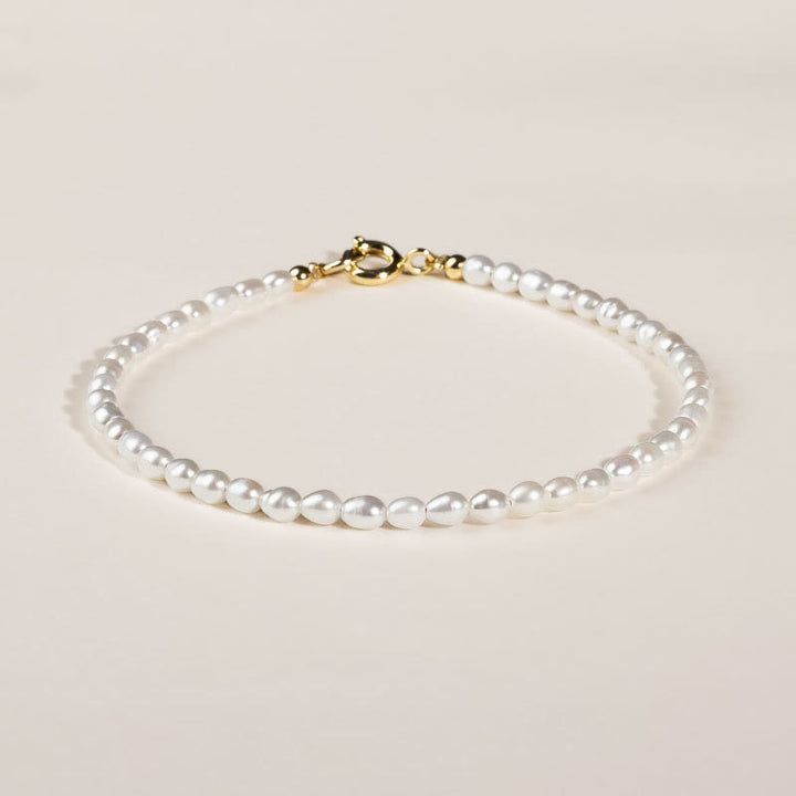Bracelet de sagesse en cuivre plaqué or 14 carats avec perles naturelles ultra fines de 2 mm et Buddha Stones