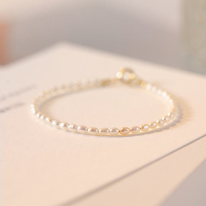 Bracelet de sagesse en cuivre plaqué or 14 carats avec perles naturelles ultra fines de 2 mm et Buddha Stones