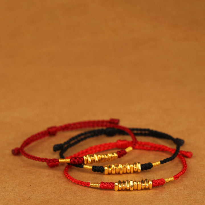 Bracelet tressé ultra fin en petites pièces de Buddha Stones en or 999 avec protection et chance
