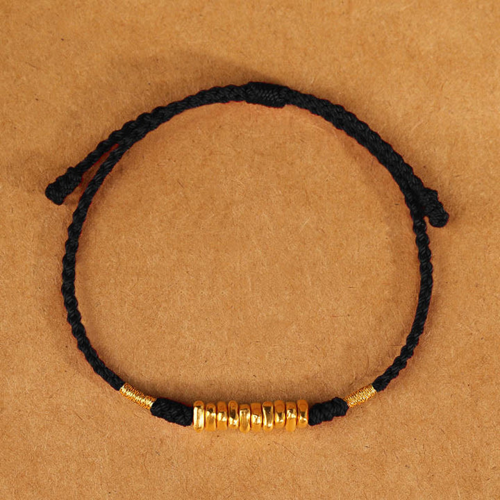Bracelet tressé ultra fin en petites pièces de Buddha Stones en or 999 avec protection et chance