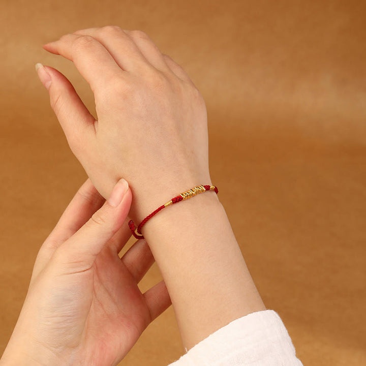 Bracelet tressé ultra fin en petites pièces de Buddha Stones en or 999 avec protection et chance