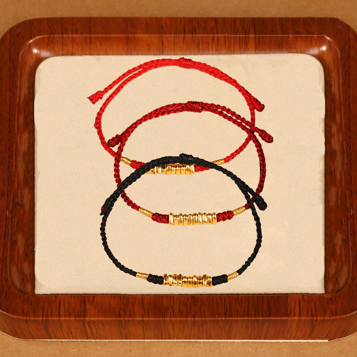 Bracelet tressé ultra fin en petites pièces de Buddha Stones en or 999 avec protection et chance