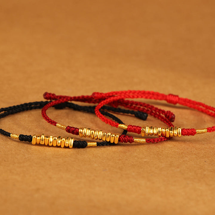 Bracelet tressé ultra fin en petites pièces de Buddha Stones en or 999 avec protection et chance