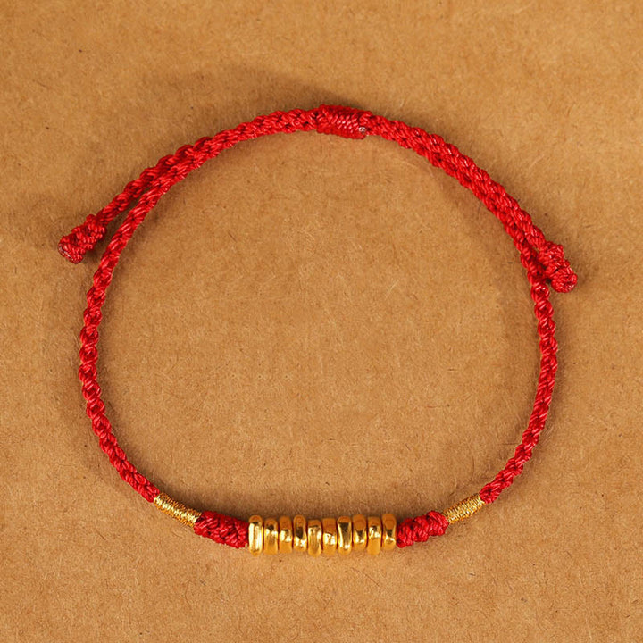 Bracelet tressé ultra fin en petites pièces de Buddha Stones en or 999 avec protection et chance