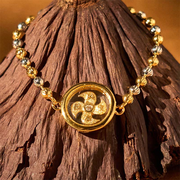 Bracelet tressé de protection en perles de moulin à vent rotatif en cuivre et laiton Buddha Stones Feng Sheng Shui Qi