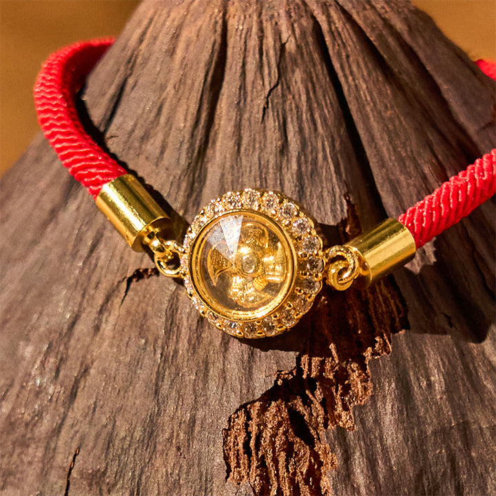 Bracelet tressé de protection Feng Sheng Shui Qi avec moulin à vent rotatif en cuivre et laiton Buddha Stones
