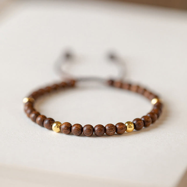 Bracelet de protection en perles de cuivre plaqué or 14 carats ultra-minces en bois de santal de 4 mm de Buddha Stones