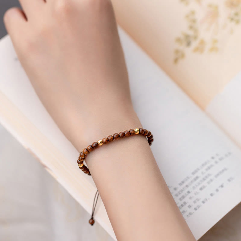 Bracelet de protection en perles de cuivre plaqué or 14 carats ultra-minces en bois de santal de 4 mm de Buddha Stones