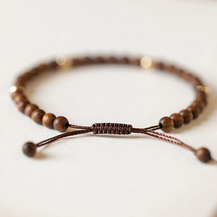 Bracelet de protection en perles de cuivre plaqué or 14 carats ultra-minces en bois de santal de 4 mm de Buddha Stones