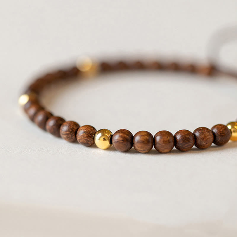 Bracelet de protection en perles de cuivre plaqué or 14 carats ultra-minces en bois de santal de 4 mm de Buddha Stones