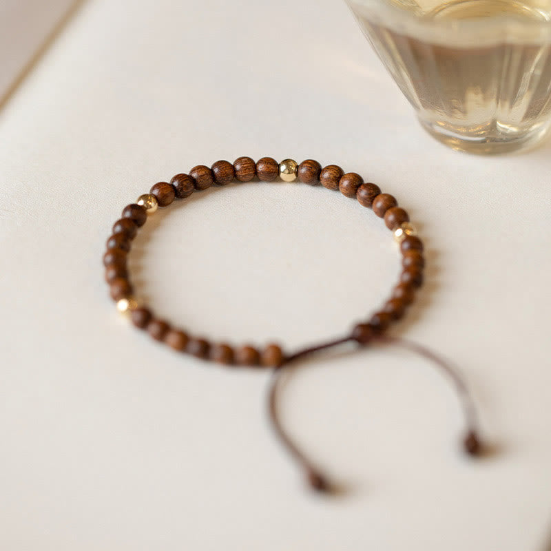 Bracelet de protection en perles de cuivre plaqué or 14 carats ultra-minces en bois de santal de 4 mm de Buddha Stones