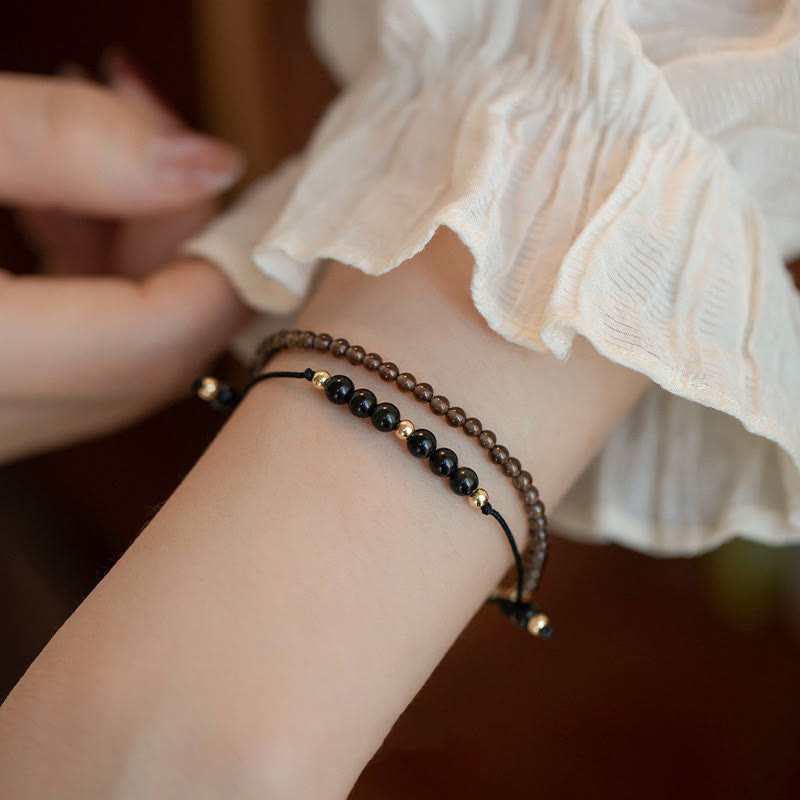 Bracelet de réussite en perles ultra-fines en quartz fumé et obsidienne noire Buddha Stones