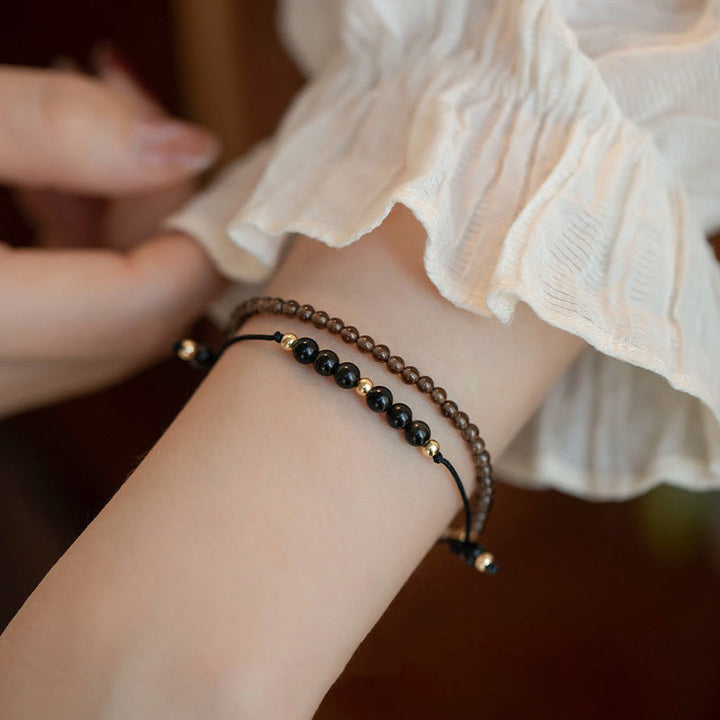 Bracelet de réussite en perles ultra-fines en quartz fumé et obsidienne noire Buddha Stones