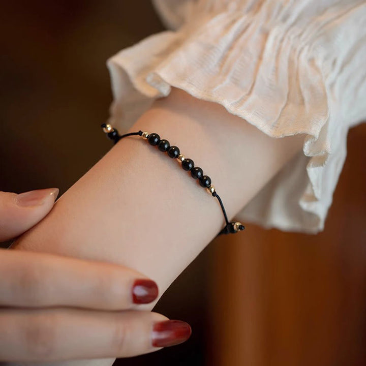 Bracelet de réussite en perles ultra-fines en quartz fumé et obsidienne noire Buddha Stones