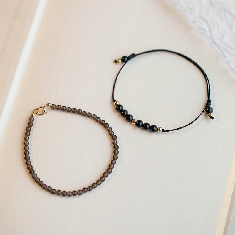 Bracelet de réussite en perles ultra-fines en quartz fumé et obsidienne noire Buddha Stones