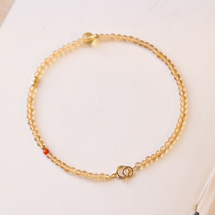 Bracelet de protection en perles de cuivre plaqué or 14 carats ultra-minces en citrine de 2 mm de Buddha Stones