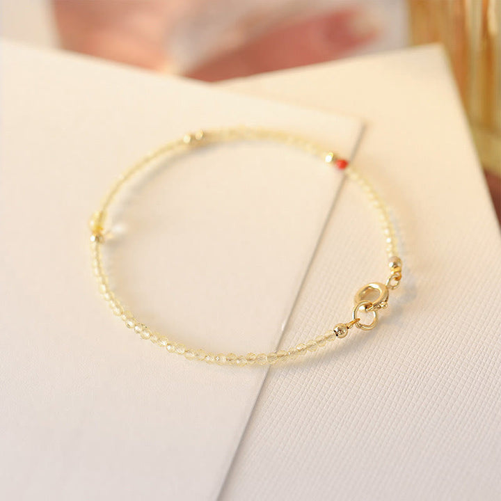 Bracelet de protection en perles de cuivre plaqué or 14 carats ultra-minces en citrine de 2 mm de Buddha Stones