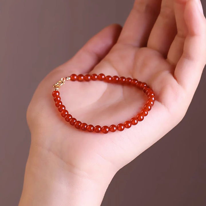 Bracelet calme en petites perles d'agate rouge ultra-fines de Buddha Stones