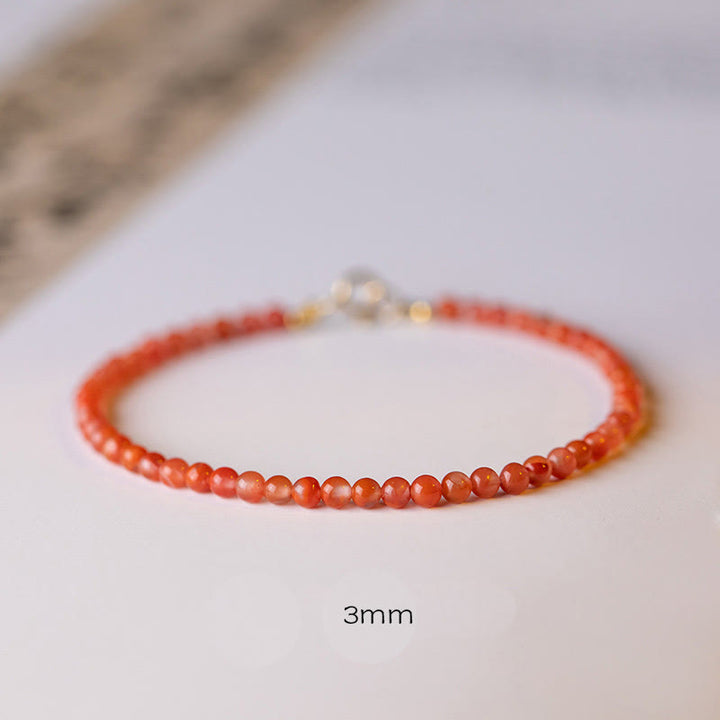 Bracelet de confiance en perles ultra-fines en agate rouge cerise naturelle de Buddha Stones
