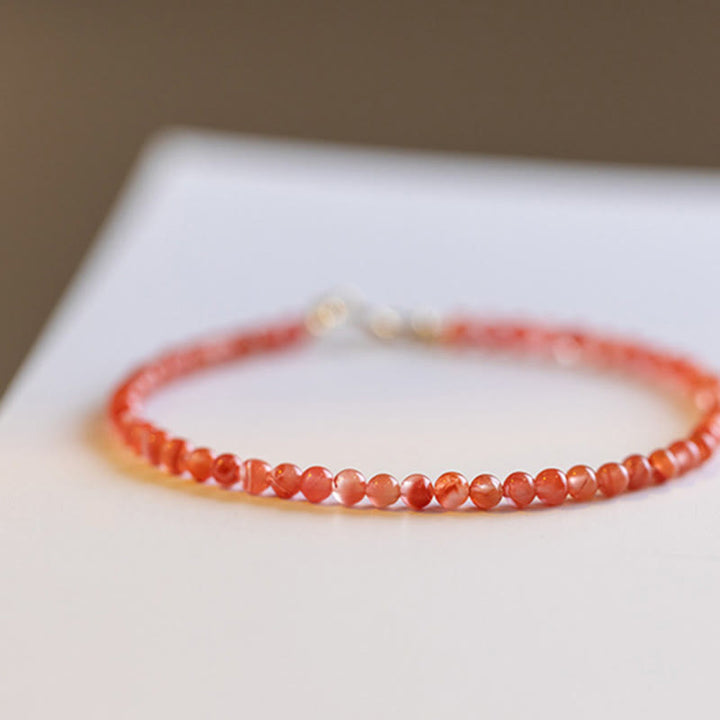 Bracelet de confiance en perles ultra-fines en agate rouge cerise naturelle de Buddha Stones