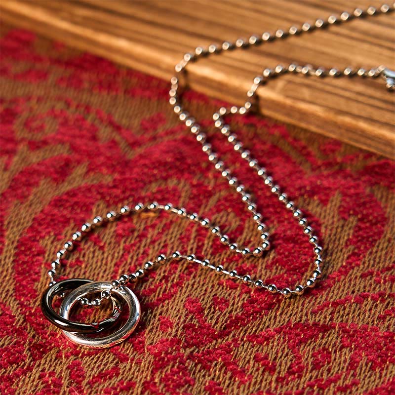 Collier pendentif porte-bonheur en cuivre avec Buddha Stones et cerceau Qiankun