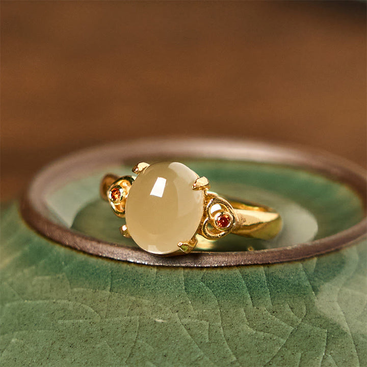 Bague ouverte porte-bonheur en cuivre en forme d'œuf de jade Hetian naturel en Buddha Stones