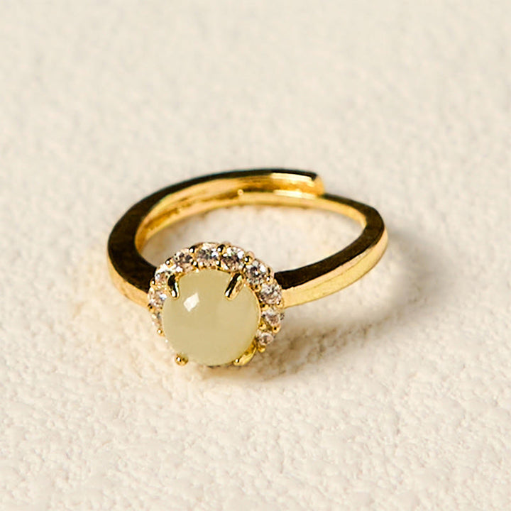 Bague de prospérité en cuivre avec œuf de jade Hetian naturel et Buddha Stones