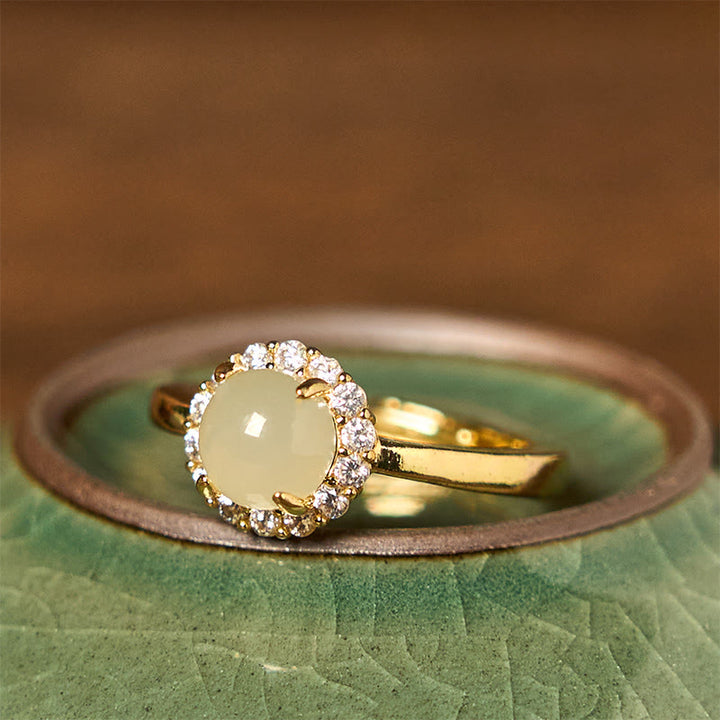 Bague de prospérité en cuivre avec œuf de jade Hetian naturel et Buddha Stones
