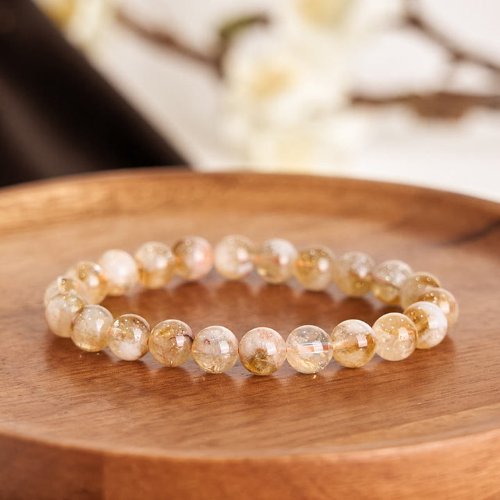 Bracelet de prospérité en cristal de flocon de neige en citrine naturelle de Buddha Stones