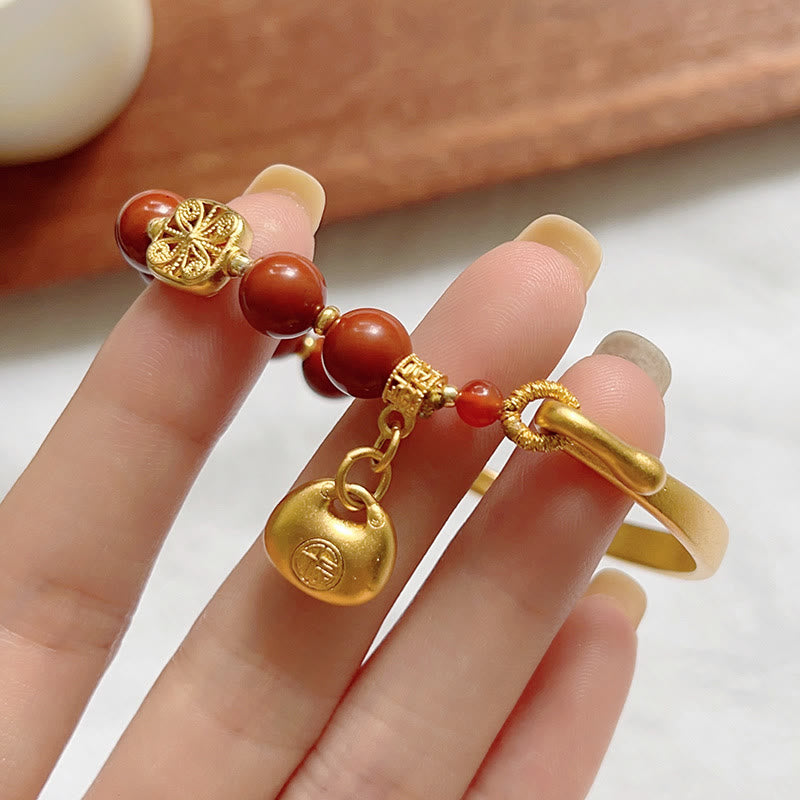 Bracelet demi-lingot en agate rouge du sud avec personnage Fu de Buddha Stones