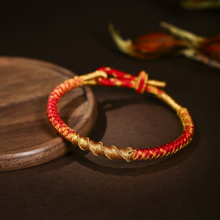 Bracelet tressé de protection en fil d'or coloré tibétain avec Buddha Stones et nœud en écailles de dragon