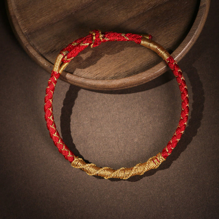 Bracelet tressé de protection en fil d'or coloré tibétain avec Buddha Stones et nœud en écailles de dragon