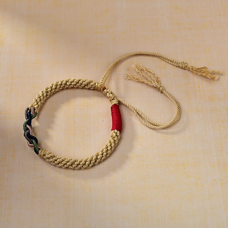 Bracelet porte-bonheur tibétain en corde de coton frotté à la main Buddha Stones