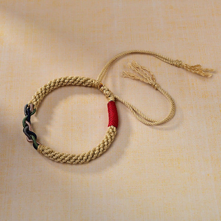 Bracelet porte-bonheur tibétain en corde de coton frotté à la main Buddha Stones