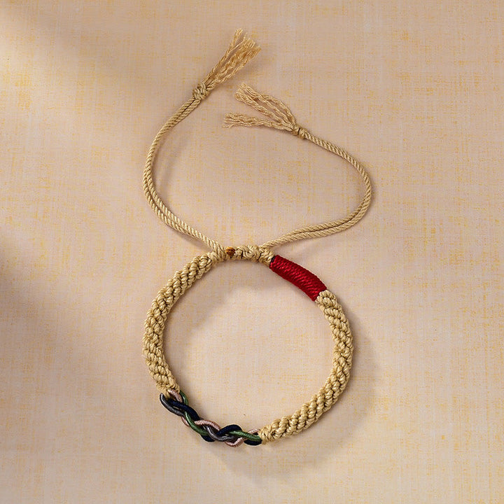 Bracelet porte-bonheur tibétain en corde de coton frotté à la main Buddha Stones