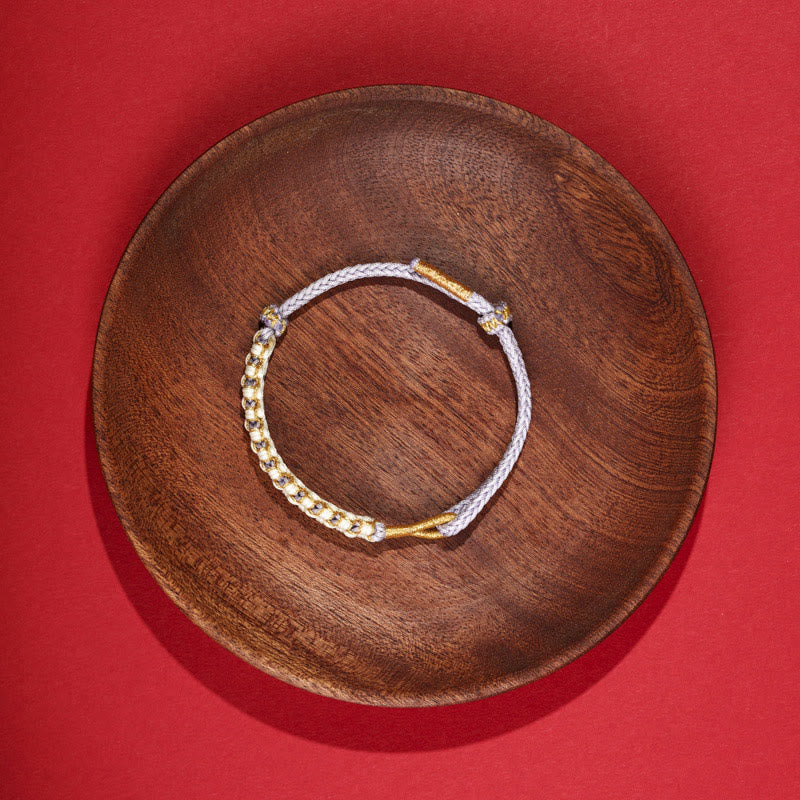 Bracelet tressé en fil d'or tibétain avec Buddha Stones et nœuds colorés en fleurs de pêcher