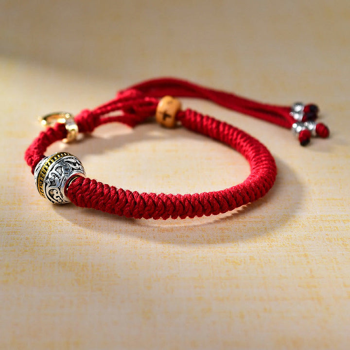 Bracelet tressé porte-bonheur en corde rouge tibétaine avec nœud en diamant et Buddha Stones