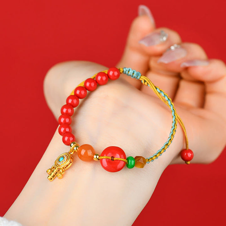 Bracelet de bénédiction avec boucle de paix et cordon de cinabre et Buddha Stones