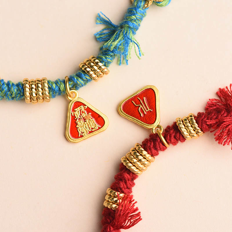 Bracelet tibétain en Buddha Stones avec pompon en forme de fleur et de déesse de la richesse Zakiram
