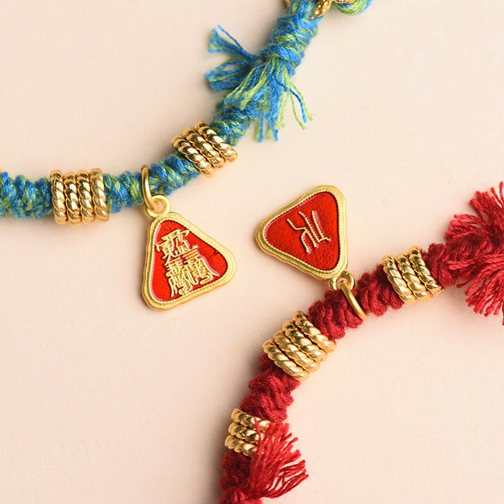 Bracelet tibétain en Buddha Stones avec pompon en forme de fleur et de déesse de la richesse Zakiram