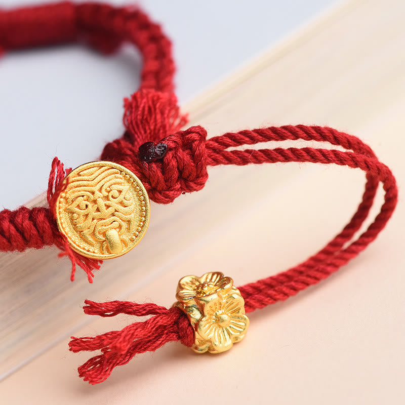 Bracelet tibétain en Buddha Stones avec pompon en forme de fleur et de déesse de la richesse Zakiram