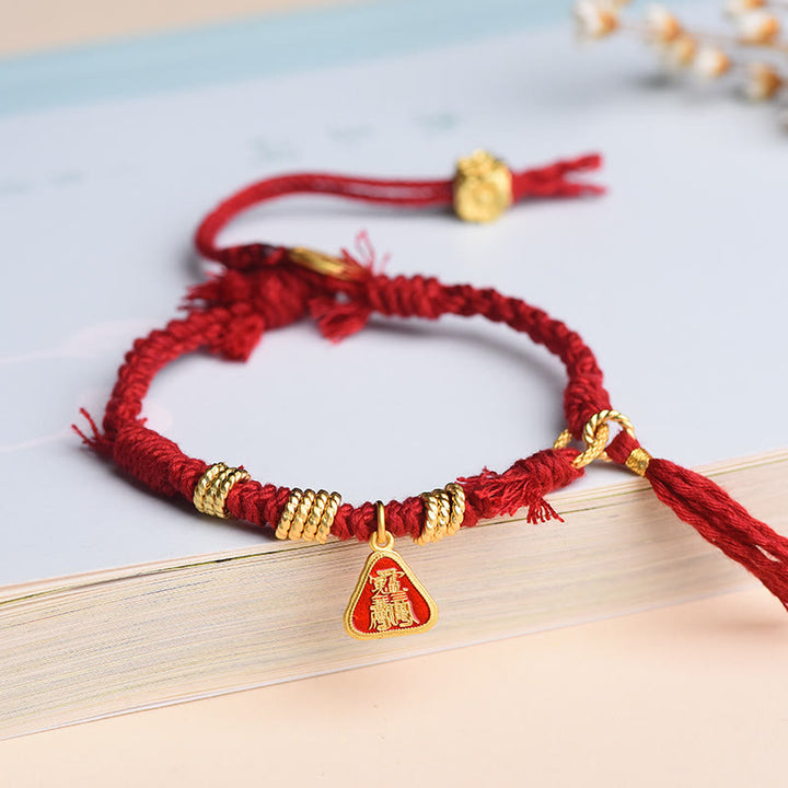 Bracelet tibétain en Buddha Stones avec pompon en forme de fleur et de déesse de la richesse Zakiram