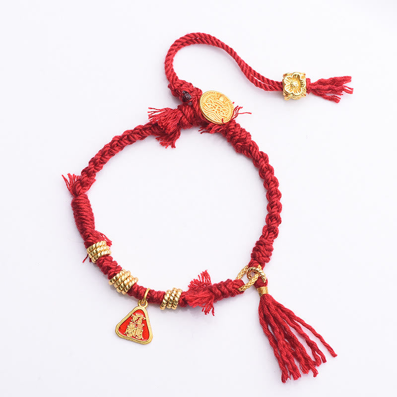 Bracelet tibétain en Buddha Stones avec pompon en forme de fleur et de déesse de la richesse Zakiram