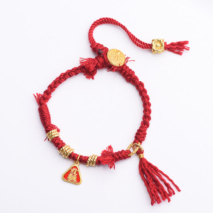 Bracelet tibétain en Buddha Stones avec pompon en forme de fleur et de déesse de la richesse Zakiram
